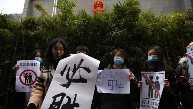 Zhou Xiaoxuan, a feminist figure who rose to prominence during Chinas #MeToo movement two years ago, arrives at the Haidian District Peoples Court in Beijing on December 2, 2020, in a sexual harassment case against one of China's best-known television host